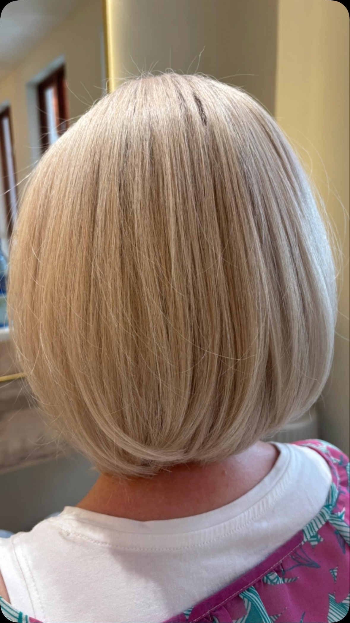 Soft, bright baby blonde bob